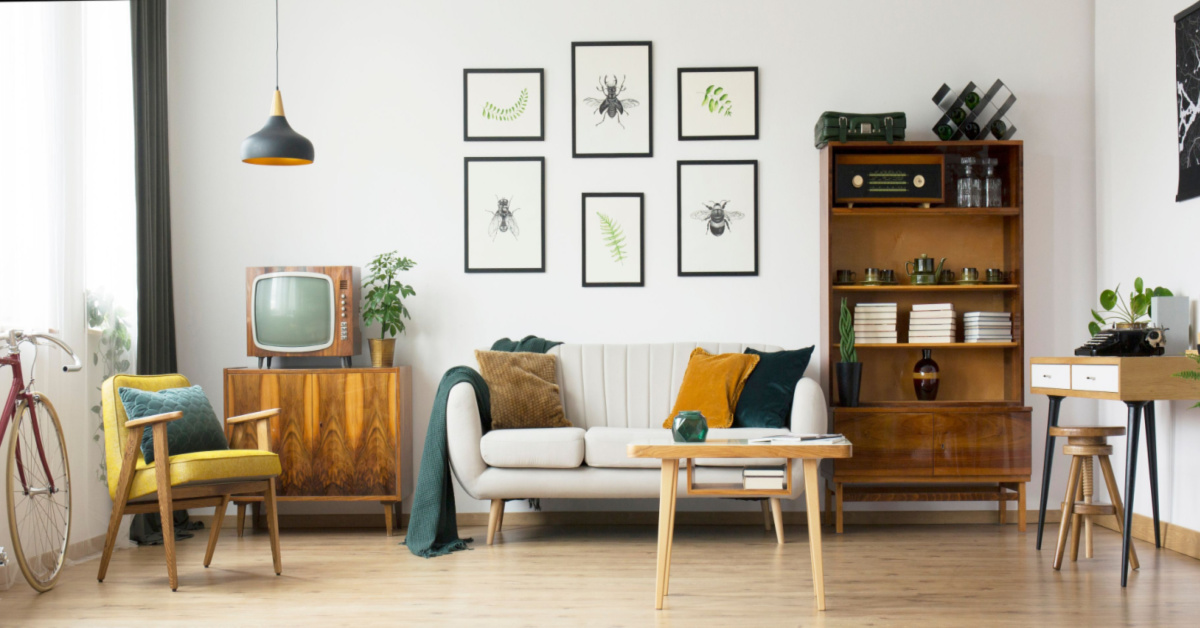 an image of a bright living room with using white walls light furniture and other tools to make a room look brighter