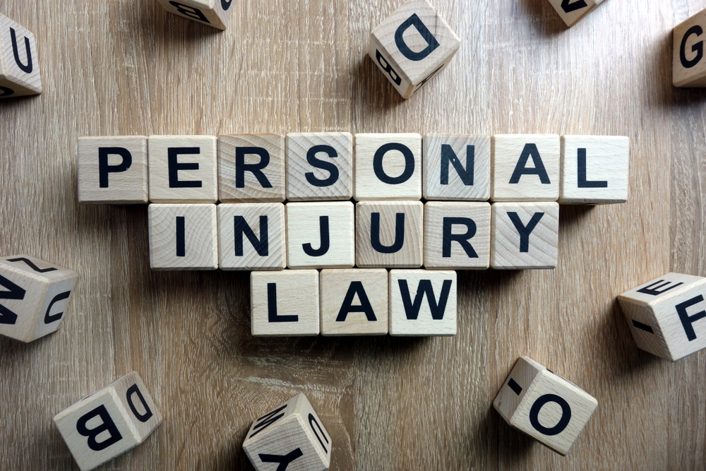 Personal,Injury,Law,Text,From,Wooden,Blocks,On,Desk