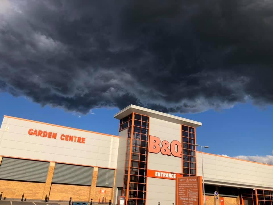 B&Q Carlisle with storm above