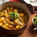 Parsnip, sprout and chestnut hotpot with cider and sprout top pesto