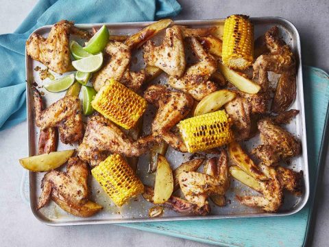 Piri-piri chicken wing, wedges and corn traybake