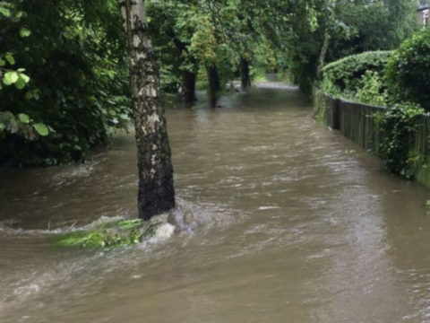 UK weather: homes evacuated after floods in north of England