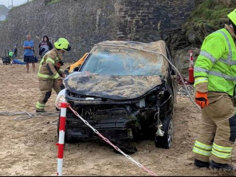 Car Drives Off Cliff And Lands On Beach